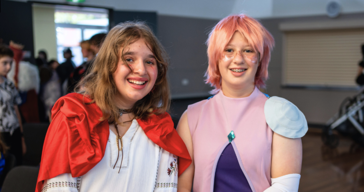 Two young people dressed in cos play at Comic Gong
